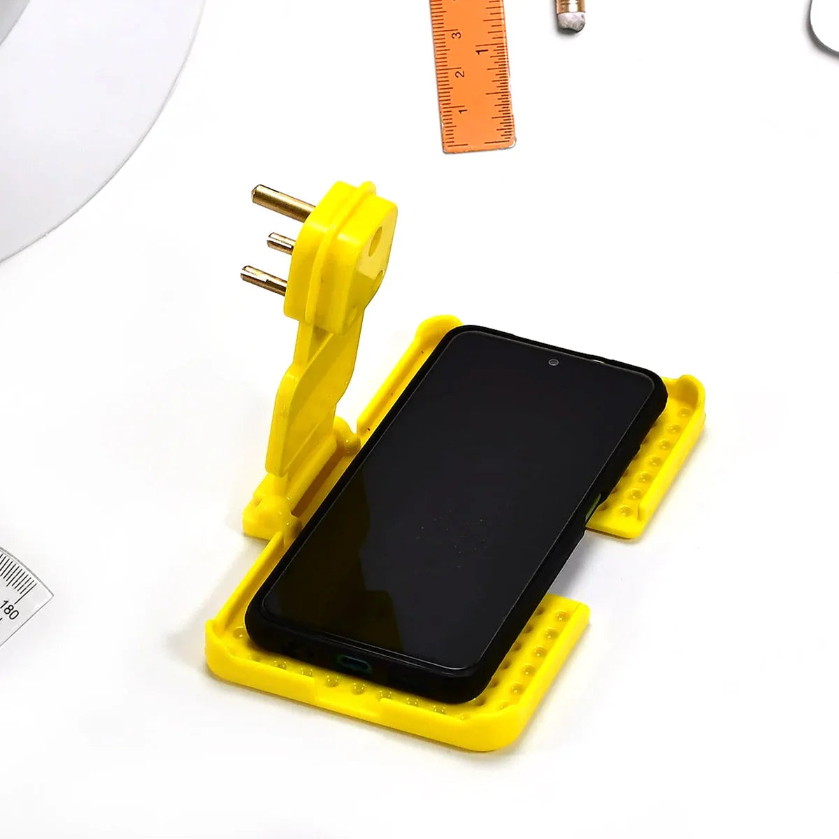 Multi-purpose Wall Holder Stand For Charging Mobile Just Fit In Socket And Hang (Mix Color 1 Pc)